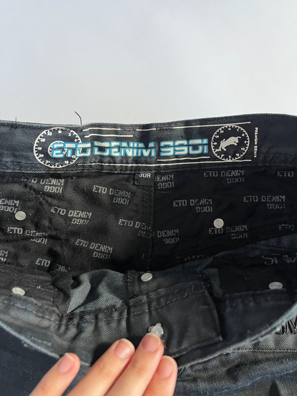Black subversive Japanese style waxed straight leg jeans