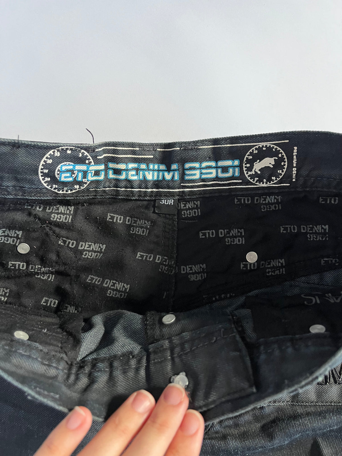 Black subversive Japanese style waxed straight leg jeans