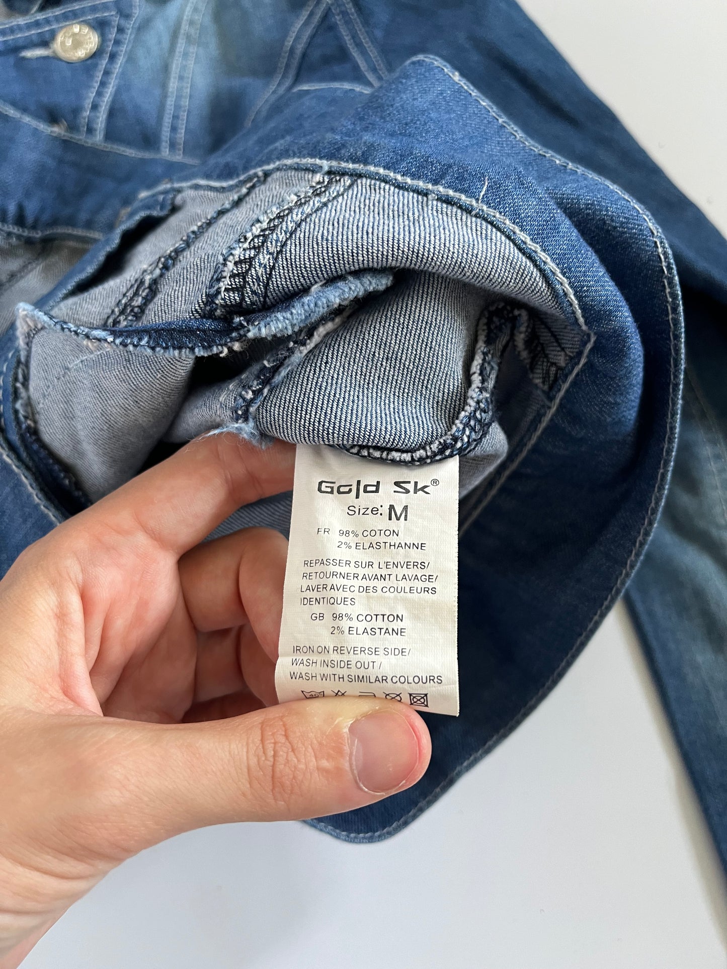 Asymmetric button up denim jacket