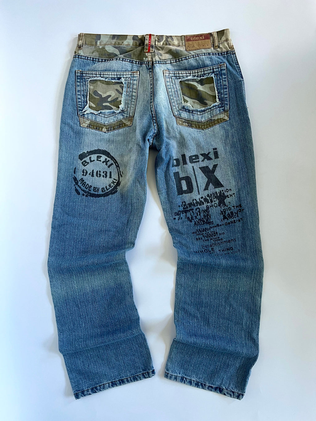 Camo distressed straight leg jeans