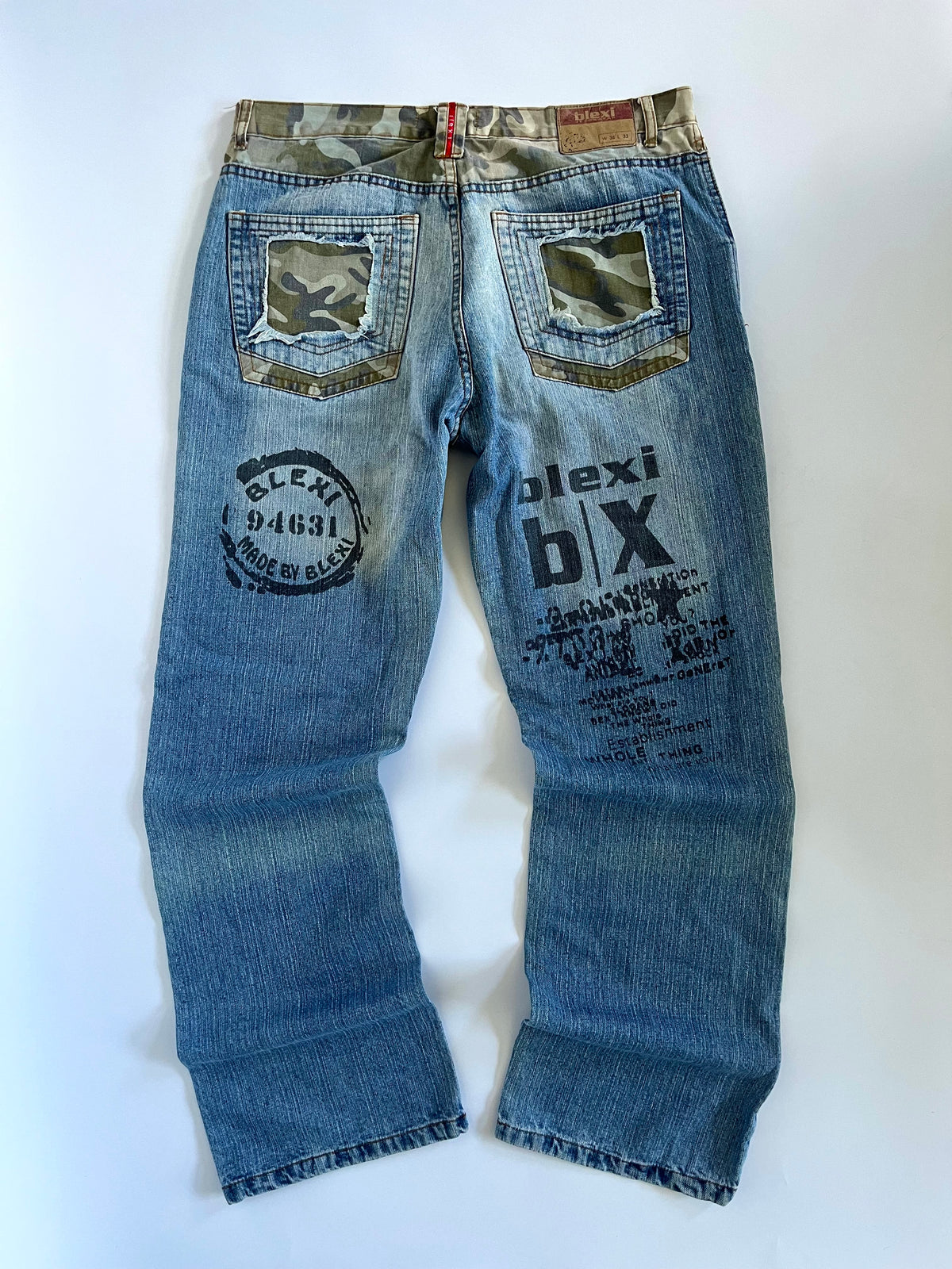 Camo distressed straight leg jeans