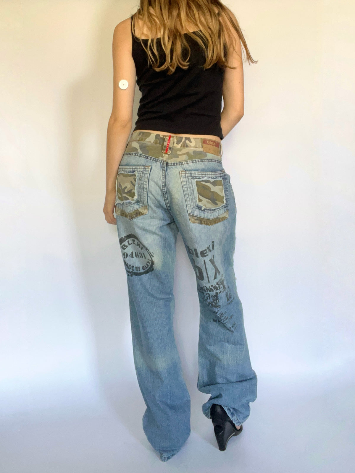 Camo distressed straight leg jeans