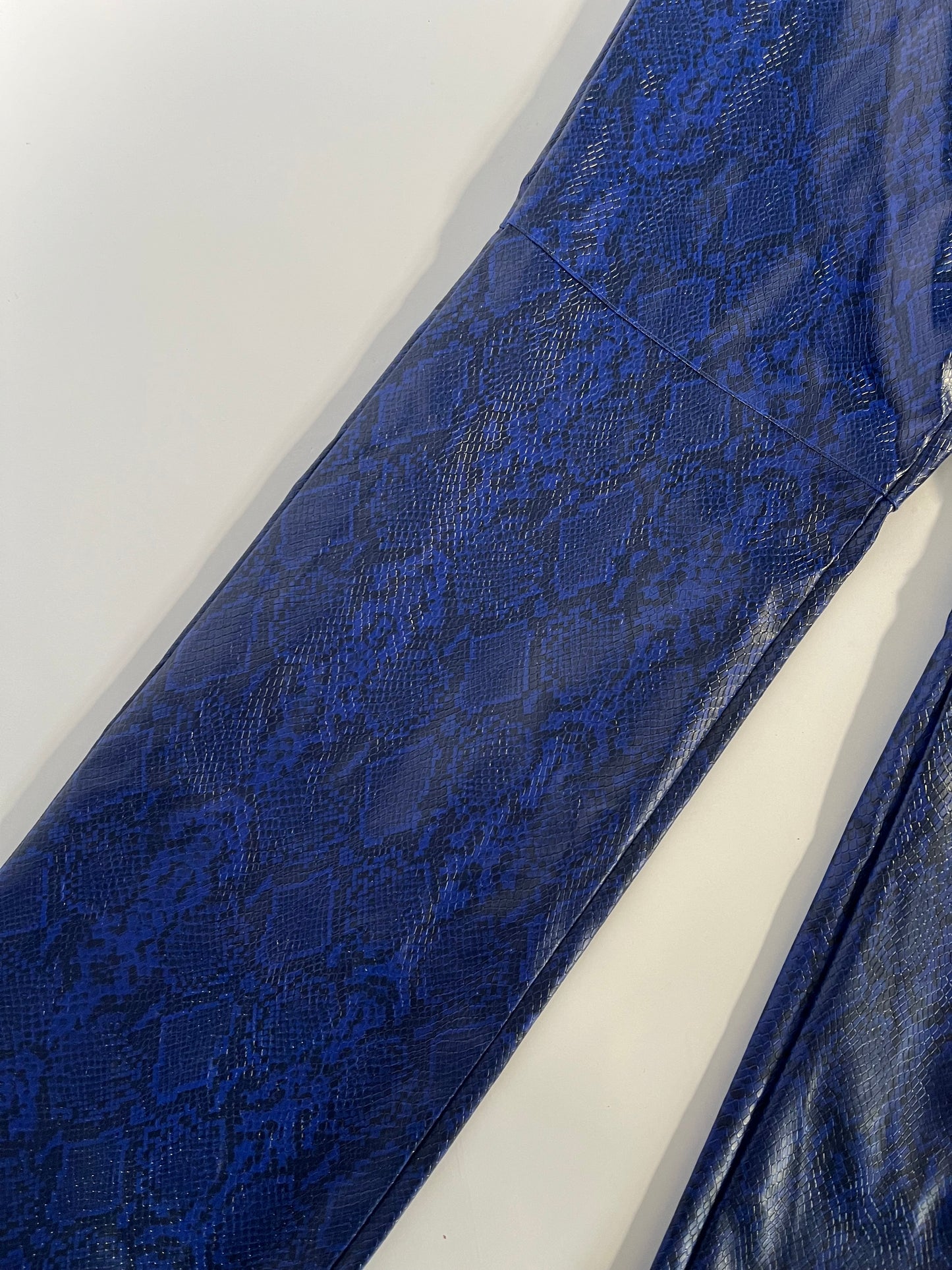 Blue patent snakeskin trousers