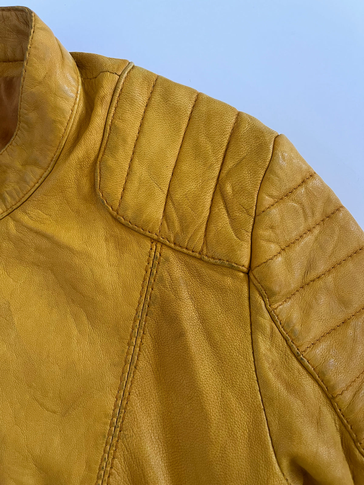Yellow leather zip up moto jacket