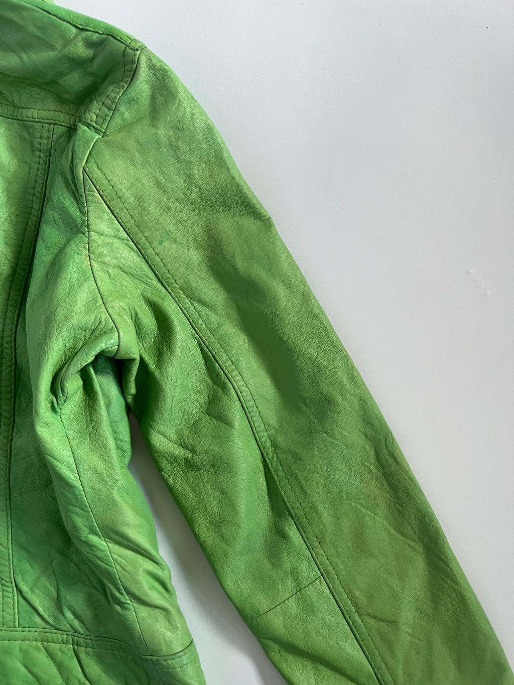 Tight fit green leather zip up moto jacket