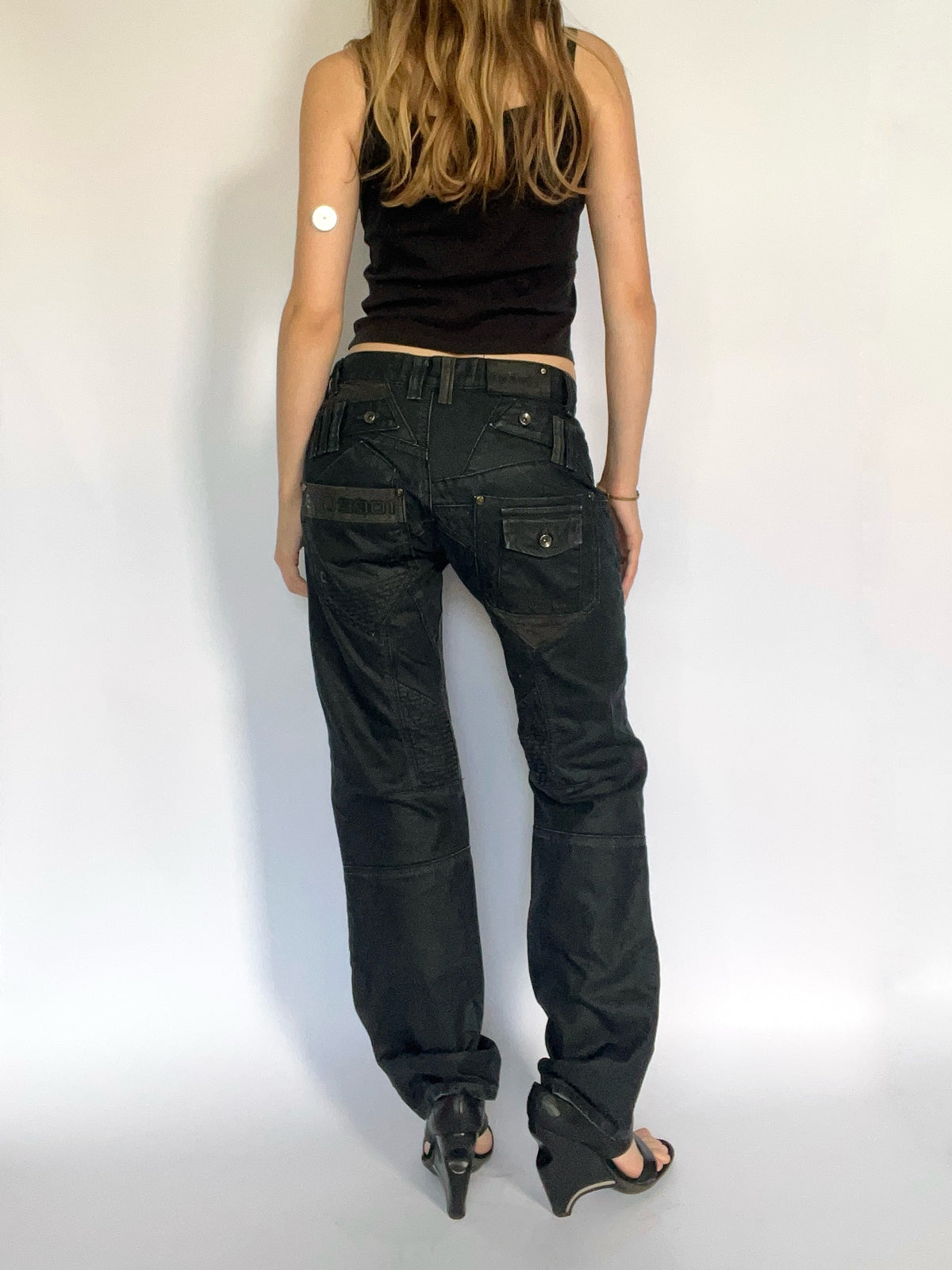 Black subversive Japanese style waxed straight leg jeans