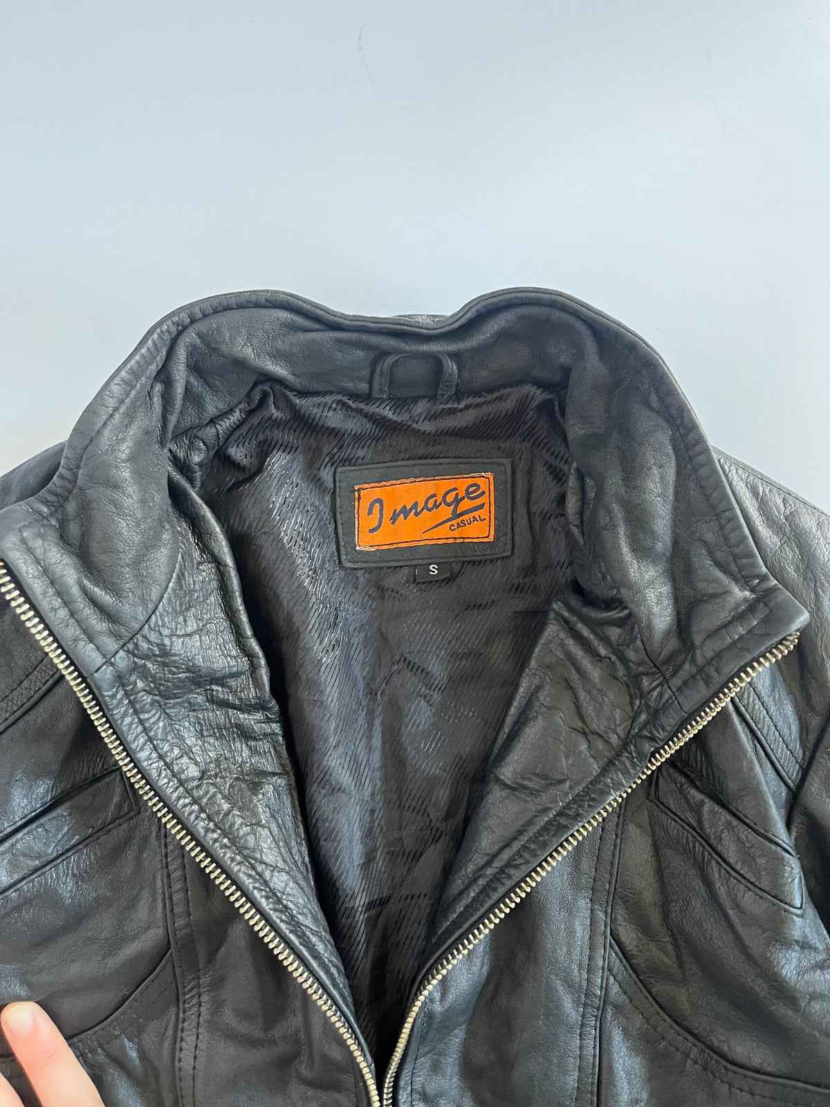 Black tight fit zip up leather jacket