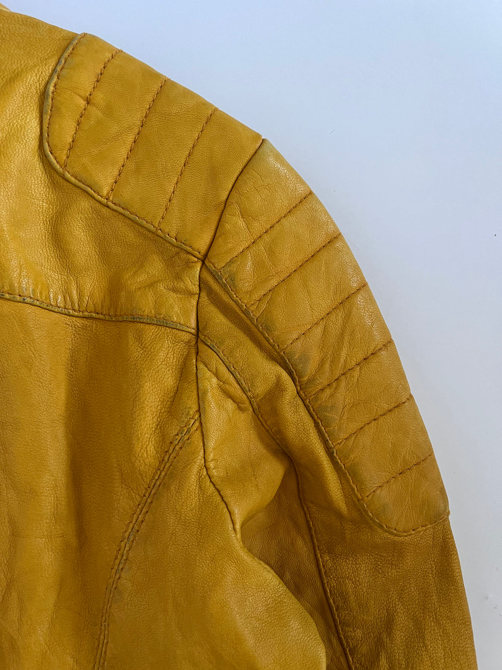 Yellow leather zip up moto jacket
