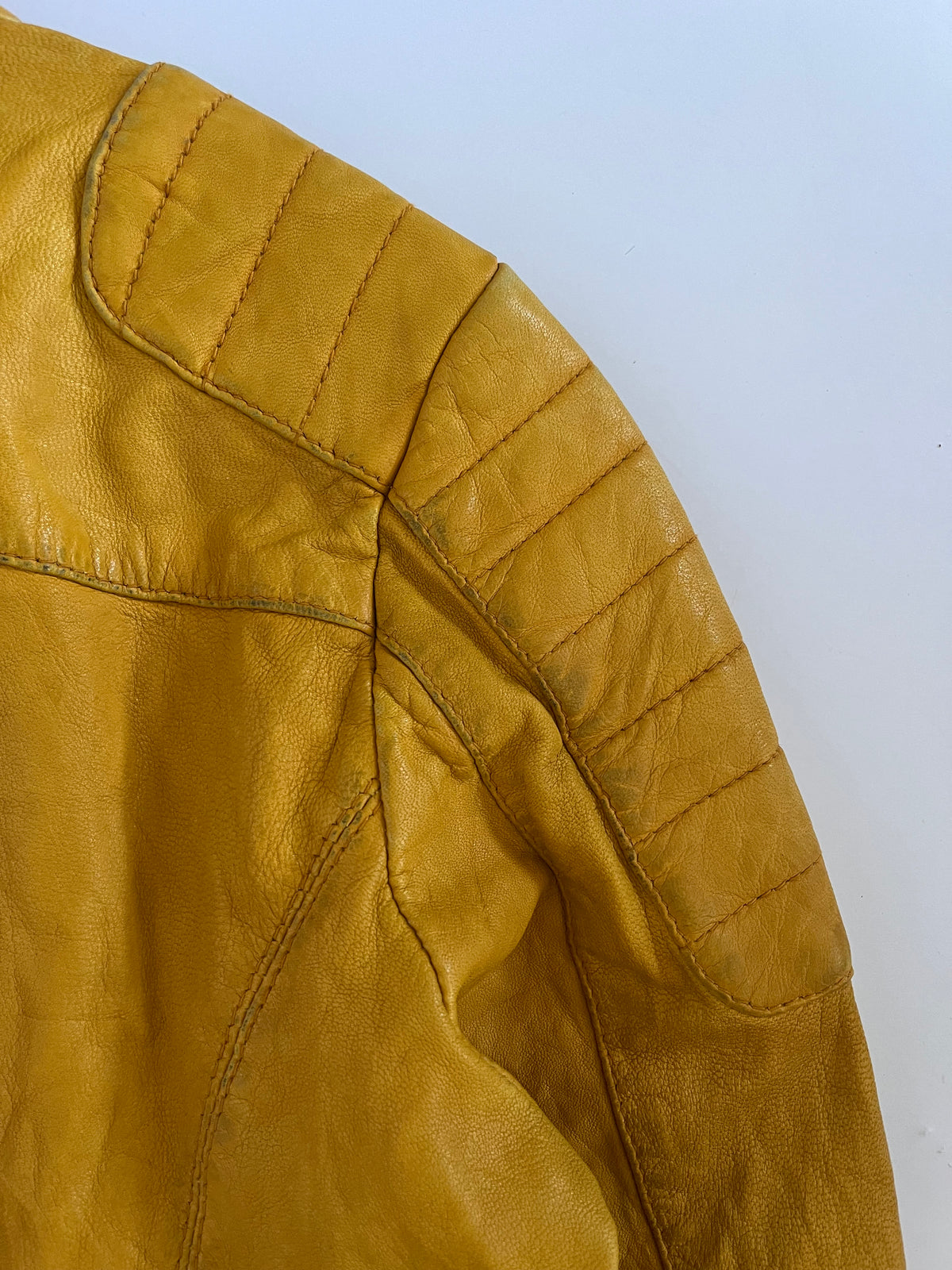 Yellow leather zip up moto jacket