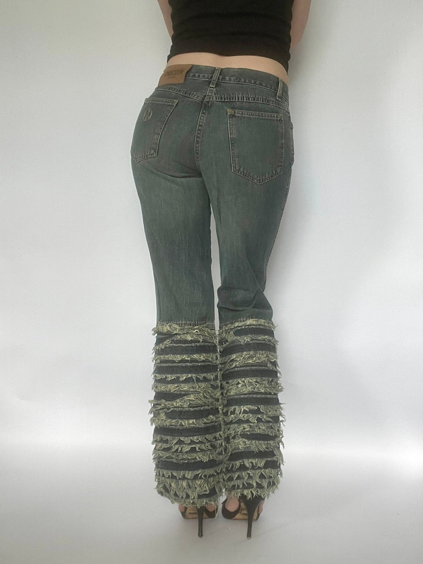 Rare 2000’s Moschino faded flare jeans