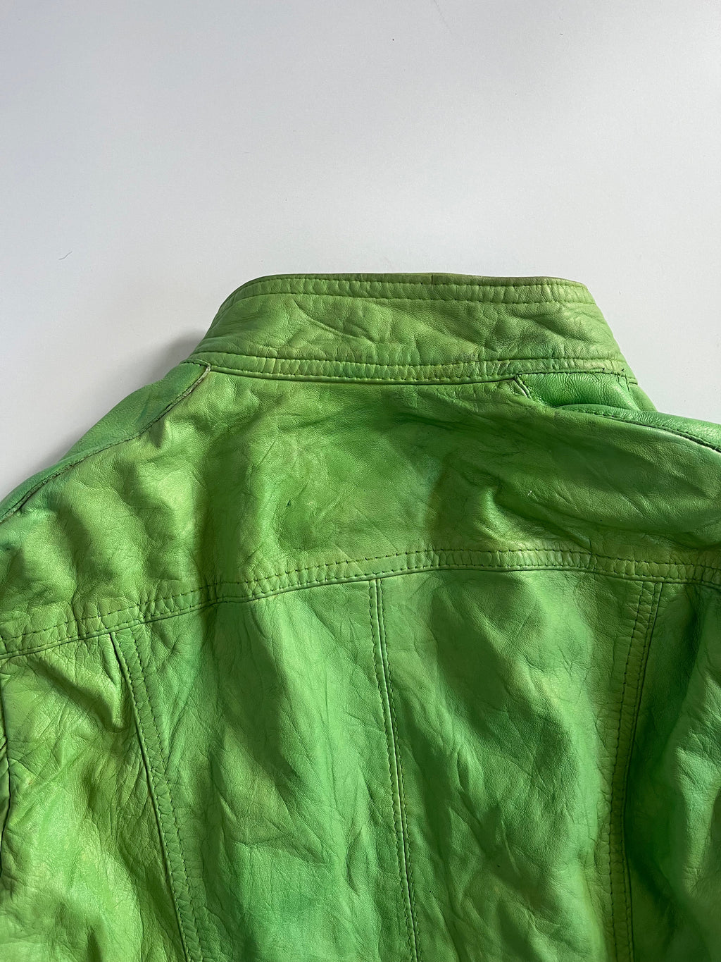 Tight fit green leather zip up moto jacket