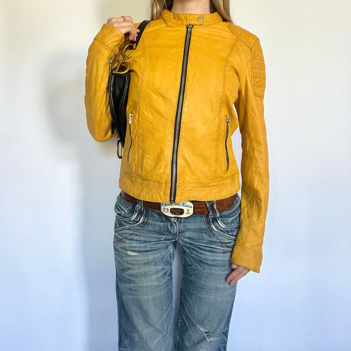 Yellow leather zip up moto jacket