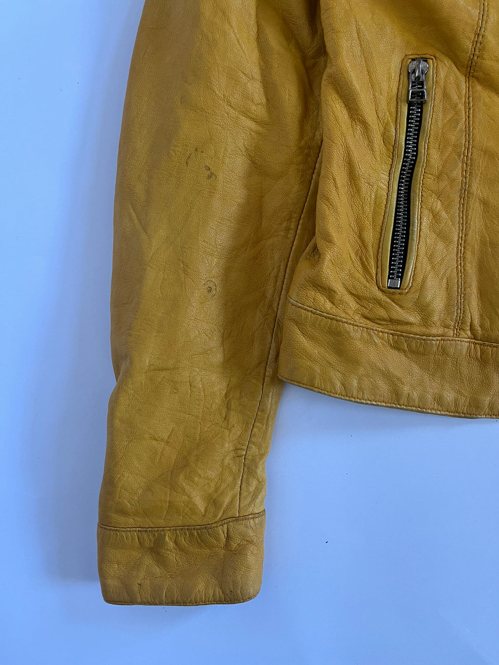 Yellow leather zip up moto jacket