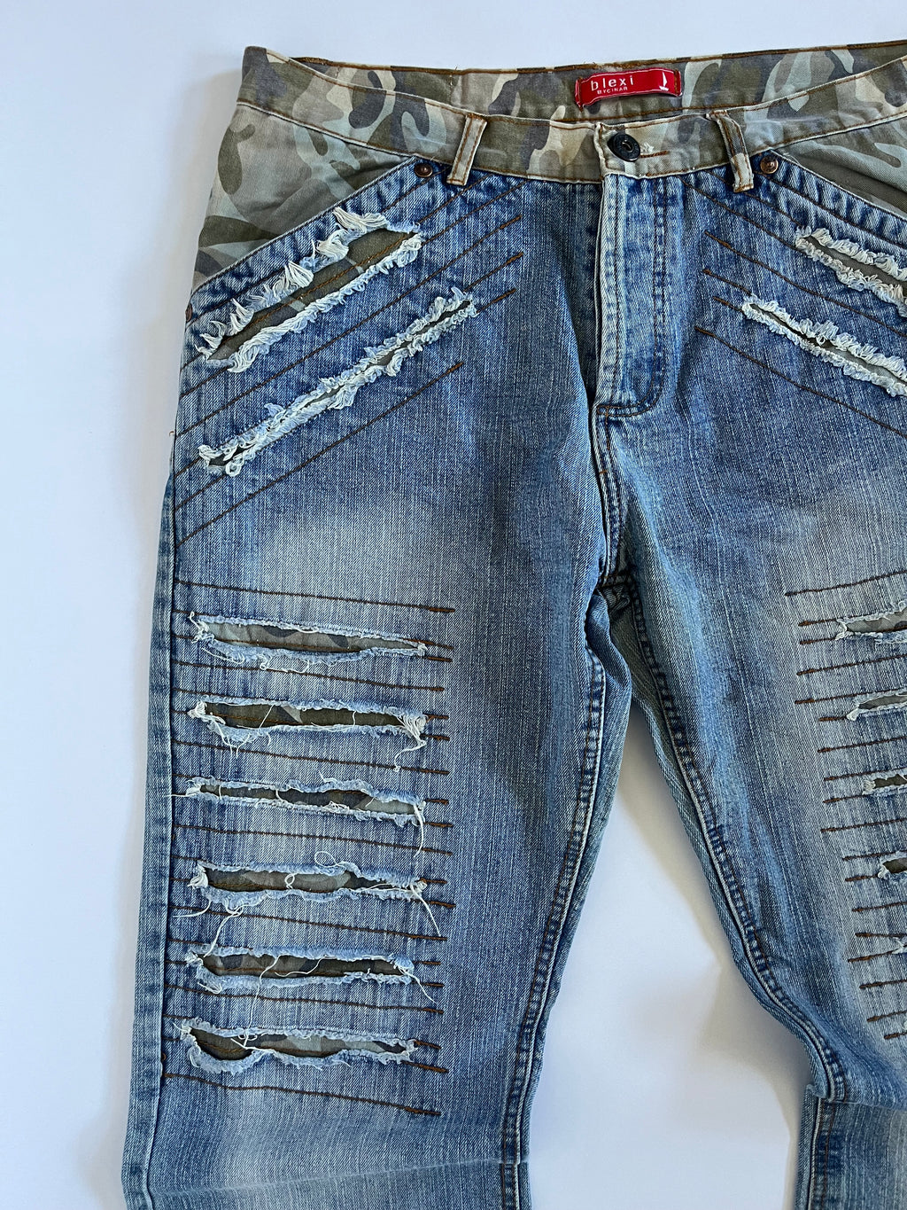 Camo distressed straight leg jeans