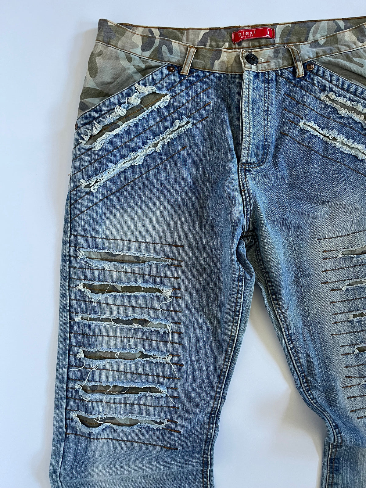 Camo distressed straight leg jeans